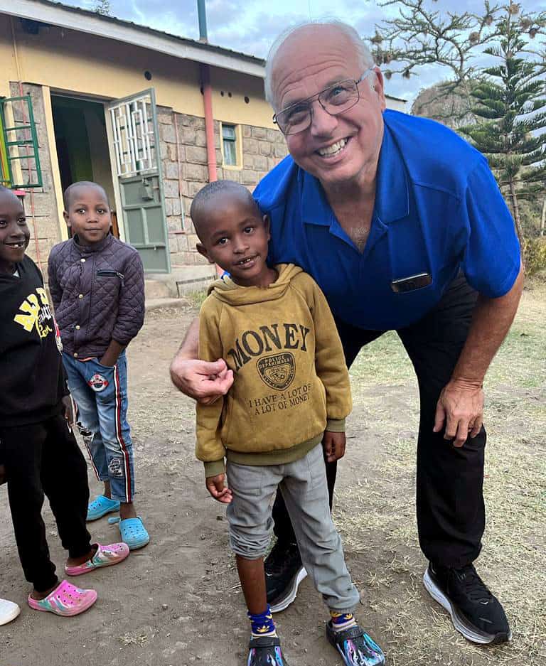 Church Elder Ken with children at the Wadada Children's Home
